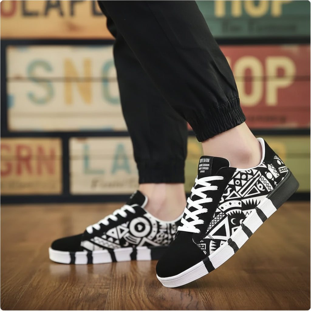 Black and white patterned sneakers on a wooden floor